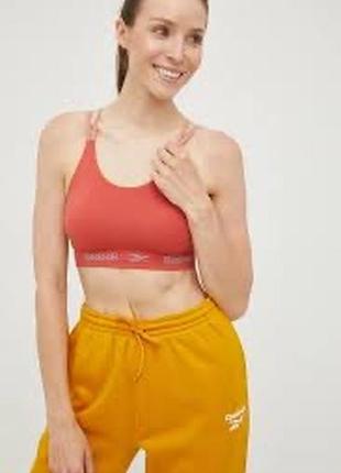Спортивный бюстгальтер reebok workout ready h65611 цвет оранжевый