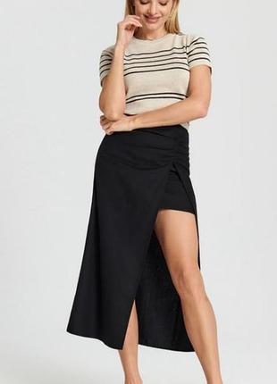 Лляна спідниця міді з розрізом