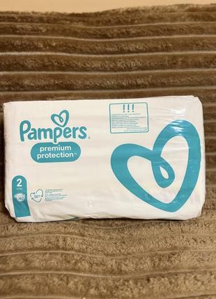 Подгузники pampers premium protection