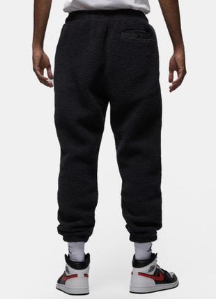 Теплі спортивні штани тедді nike jordan flight artist Night pant dv1570-0104 фото