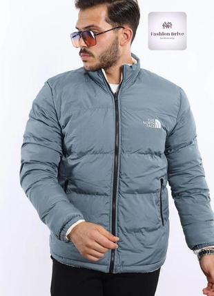 Двусторонняя куртка tnf
