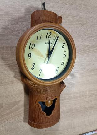 Часы настенные с маятником фигурные