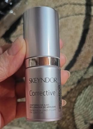 Крем-сыворотка с эффектом филлера для кожи вокруг глаз skeyndor corrective