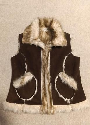 Жилет хутро.