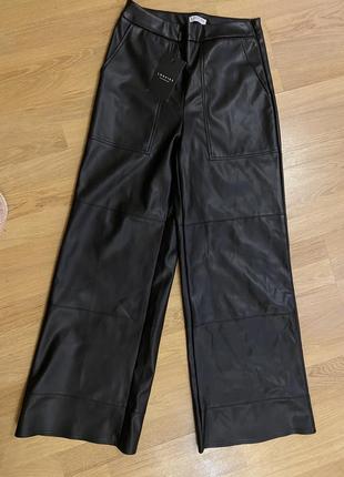 Штани кожані