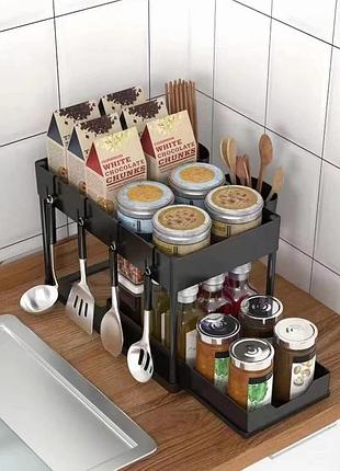 Органайзер - підставка для зберігання на кухні з дворівневий, що виїжджає поличкою.