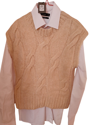 В'язана жилетка, безрукавка