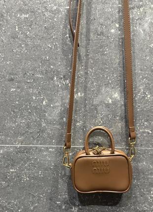 Малесенька сумочка в стилі miu miu