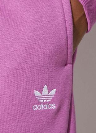 Рожевий бузковий спортивний утеплений зимовий костюм adidas originals essentials fleece оригінал5 фото