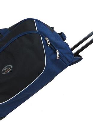 Сумка дорожная на колесах 57l wallaby украина 10428-6 синяя с nia-mart