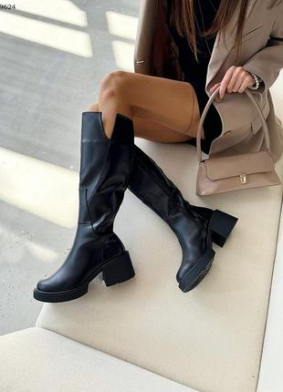 Шкіряні високі чоботи