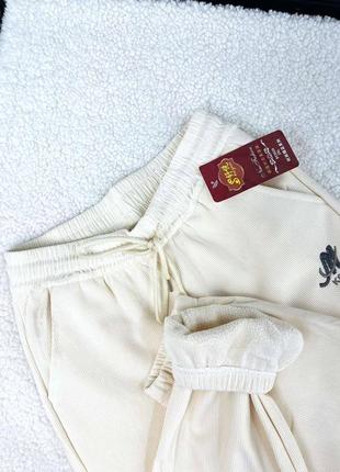 Женские теплые брюки на меху