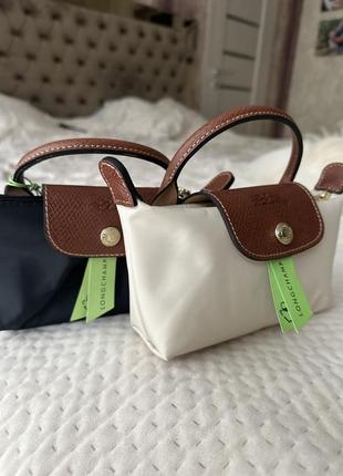 Сумочка в хорошем качестве со всеми логотипами longchamp