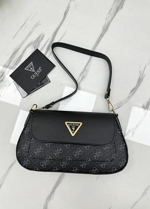 Сумка guess mini bagget из эко-кожи, стильный вид и продуманные детали делают этот аксессуар универсальным.
