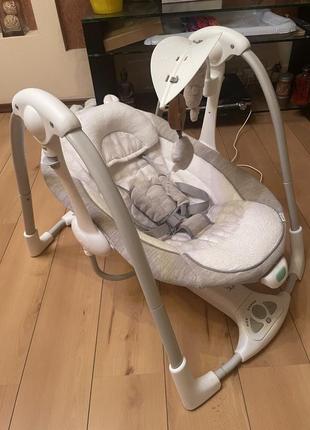 Портативне крісло-гойдалка, заколихуючий центр