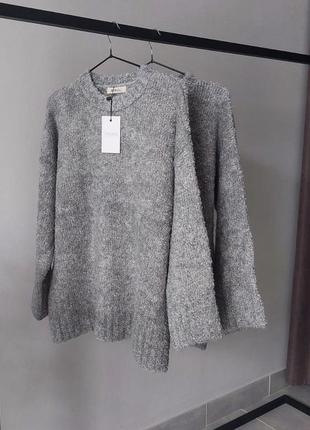 Жіночий подовжений в'язаний джемпер oversize