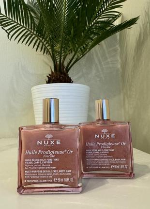 Мультифункциональная сухая маселка с блестками для лица, тела и волос nuxe