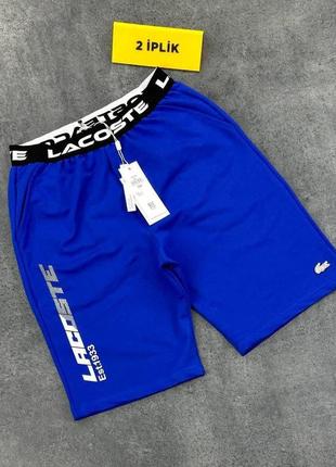 Мужские шорты синие lacoste s m