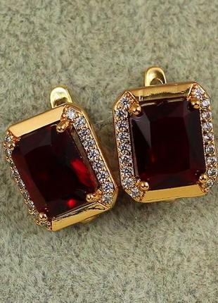 Сережки xuping jewelry великий прямокутник з червоним каменем 1,4 см золотисті
