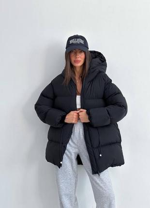 Дутый пуховик на кулиске с капюшоном