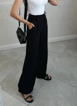 Легкі брюки з льону