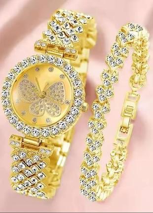Годинник наручний жіночий золотистий з браслетом із камінчиками зі стразами