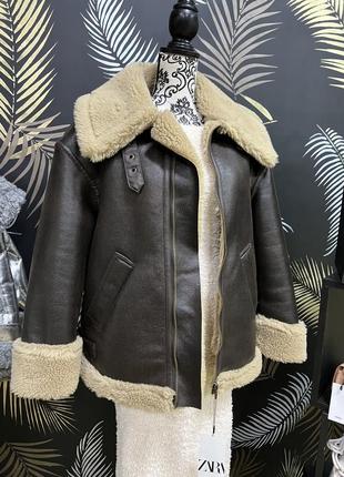 Трендовая удлиненная дубленка zara