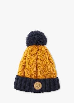 Вязанная детская зимняя шапка с косами на меху с бубоном palomino 98-104