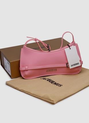Женская розовая сумка из натуральной кожи в стиле jacquemus le bisou ceinture leather shoulder bag in pink