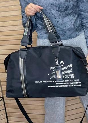 Жіноча чоловіча якісна дорожня спортивна  сумка чорна