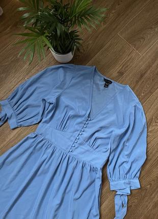 Сукня блакитного кольору