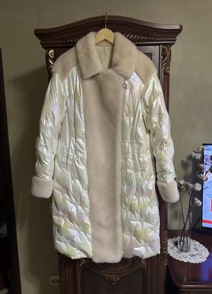 Надзвичайно гарний пуховик