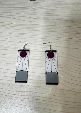 Серги з манги клинок, що розсікає демонів.