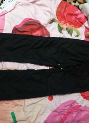 Теплые брюки 42 размер