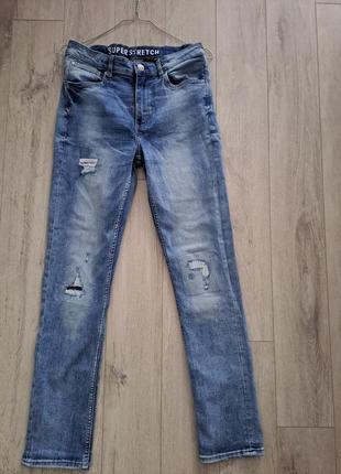 Джинси на підлітка в ідеальному стані