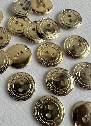 Пуговица блузочная  с ободком 2отв золотая 16мм пластик