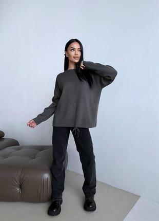 Женский удлиненный свитер в стиле oversize на завязках 42-466 фото