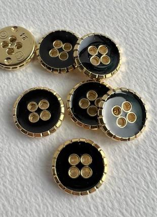 Ґудзик блузочний золотий бортик 4отв зелений 15мм пластик