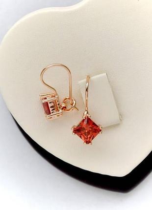 Сережки французька застібка xuping m&l з червоними кристалами.