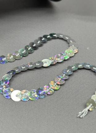 1 м - пайетка на нитке 7 мм - серебро голограмма