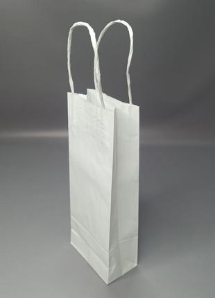 Бумажный пакет с ручками 110х60х270 мм.