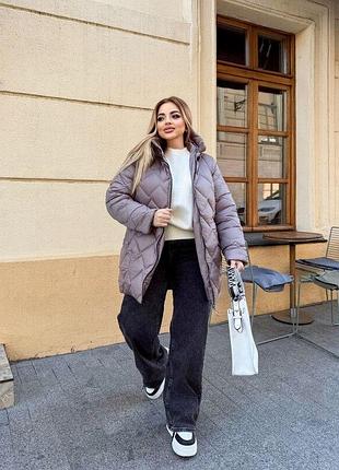 Зимові куртки великих розмірів9 фото