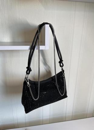 Жіноча сумка багет чорного кольору в блискітках