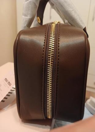 Коричнева сумочка miu miu6 фото