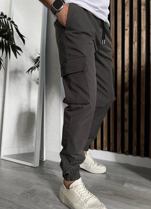 Мужские брюки с карманами из хлопка7 фото