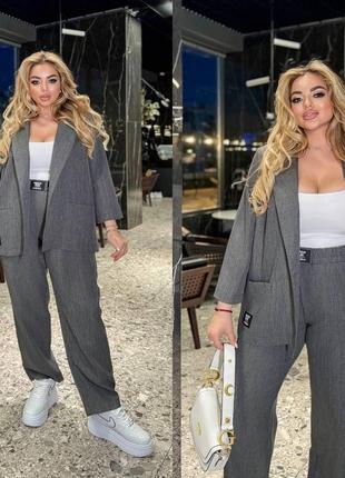 Женский летний костюм из льна-меланжа пиджак и брюки прямого кроя размеры 50-60