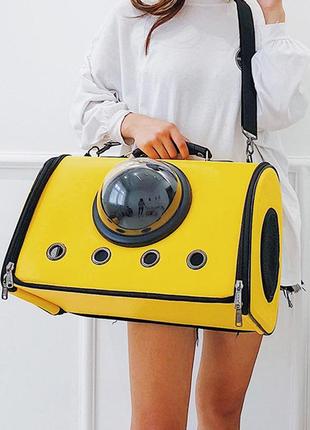 Сумка з ілюмінатором для перенесення котів та собак 41x29x25 см cosmopet cp-18 yellow4 фото