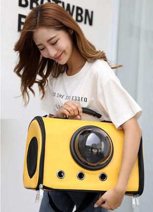 Сумка з ілюмінатором для перенесення котів та собак 41x29x25 см cosmopet cp-18 yellow6 фото