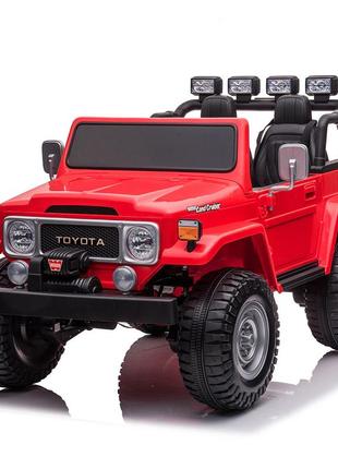 Дитячий двомісний джип toyota land cruiser (червоний колір) з пультом дистанційного керування 2.4g