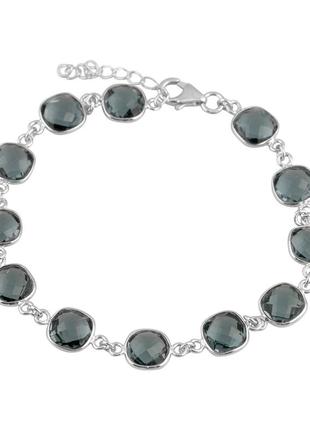 Серебряный браслет silverthin с топазом лондон блю 24.667ct, вес изделия 6,8 гр (2118114) 1720 размер